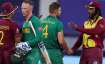 West Indies' Shimron Hetmyer, left, congratulates South Africa's Rassie van der Dussen as West Indie