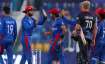 Afghanistan players celebrate after defeating Namibia by 62 runs in their Cricket Twenty20 World Cup