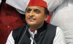 SP chief Akhilesh Yadav addresses a press conference at