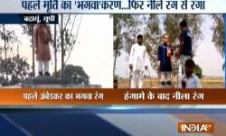 BSP leader repaints UP govt's 'saffron' Ambedkar statue blue