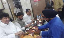 Photo of Congress leaders eating at a Delhi restaurant