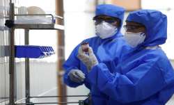 China orders re-test of recovered Covid-19 patients, intensified screening of asymptomatic cases