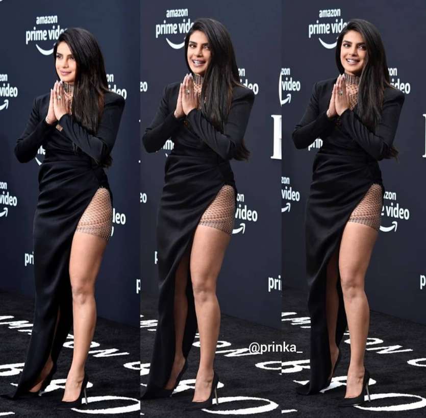 Priyanka looked absolutely stunning in her Black thigh-high slit dress by Galia Lahav.  