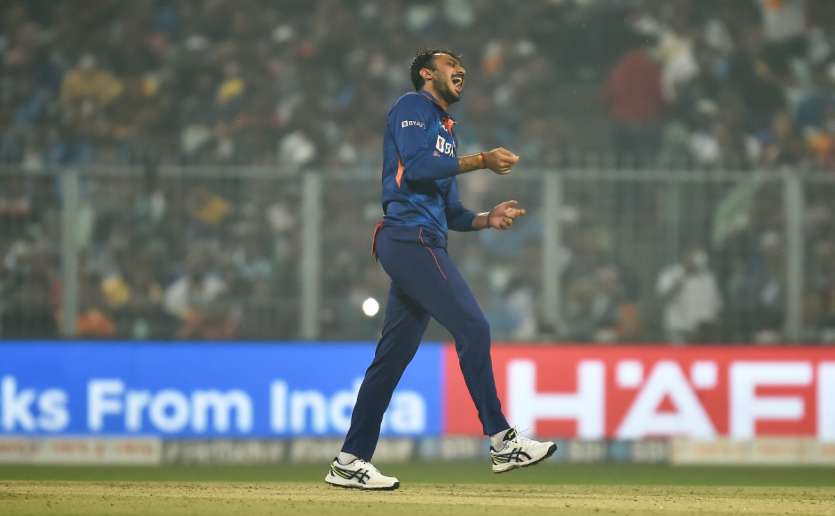 Axar Patel of India celebrates the wicket of Glenn Phillips of New Zealand during the Third T20 International match between India and New Zealand at Eden Gardens on November 21, 2021 in Kolkata, India.