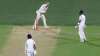 Nathan Lyon clips off the bails while Virat Kohli is in the
