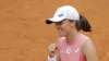 Poland's Iga Swiatek celebrates after defeating Czech
