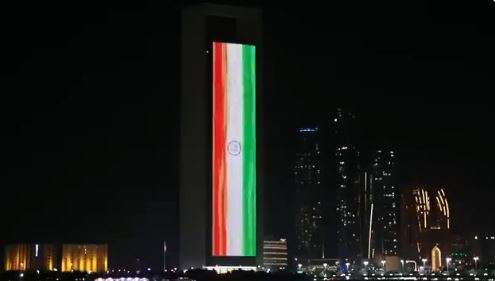 The flag of India displayed on the facade of the ADNOC