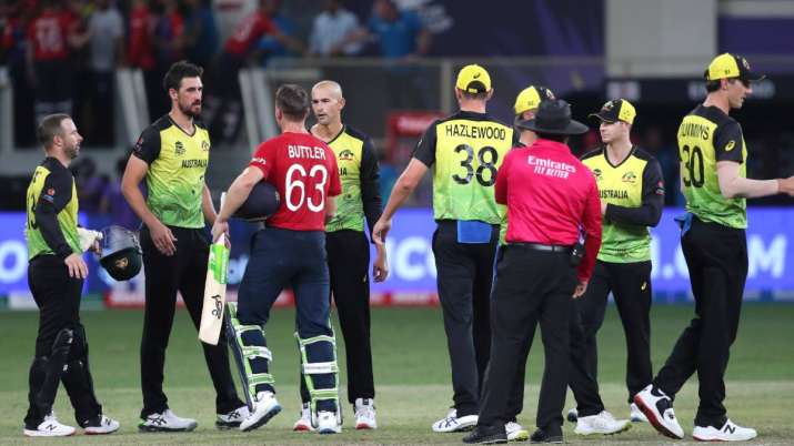 Australian players congratulate England's Jos Buttler during the Cricket Twenty20 World Cup match.